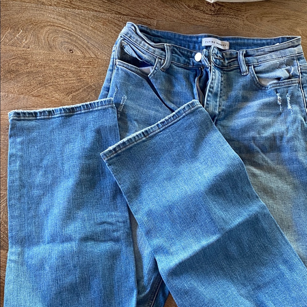 Flying monkey frayed knee jeans